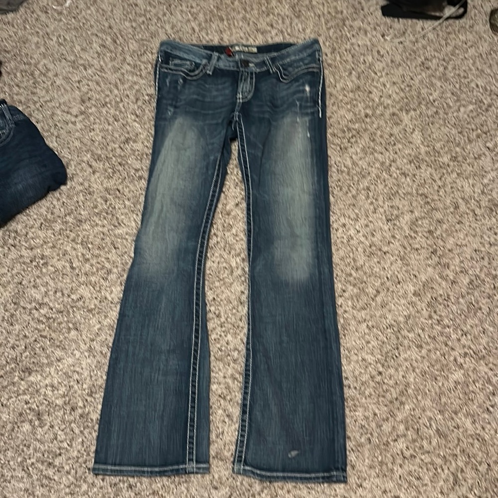 Used ripped jeans